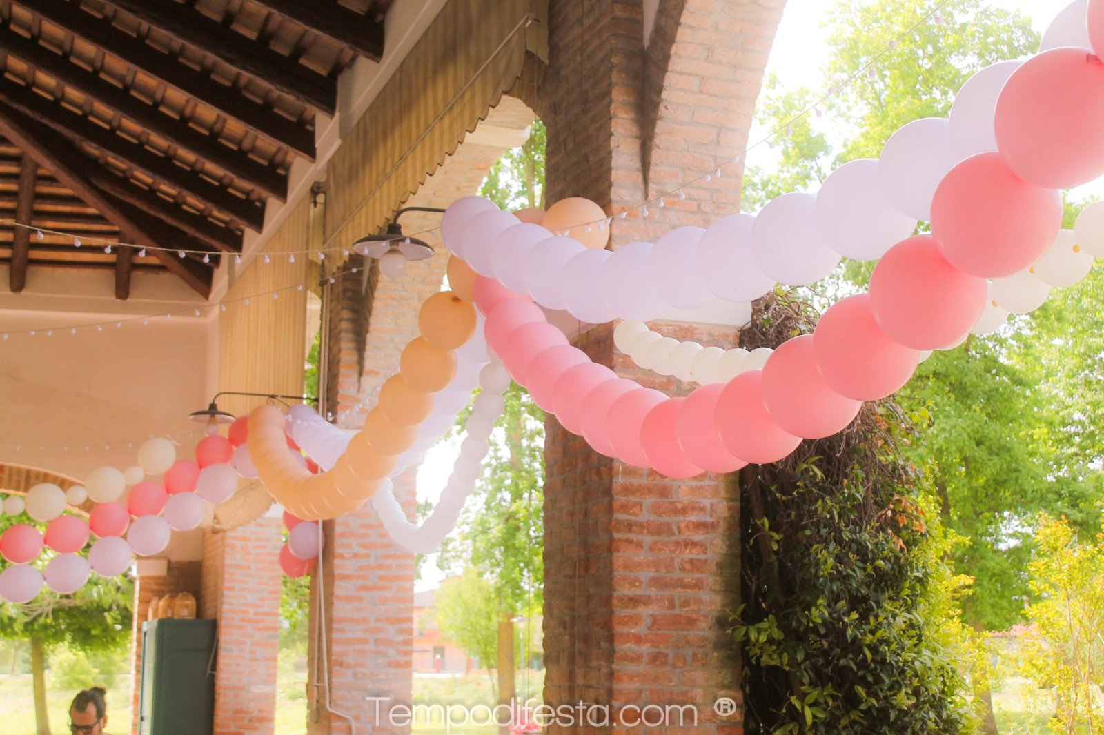 Guirnalda de globos rosa, durazno y blanco